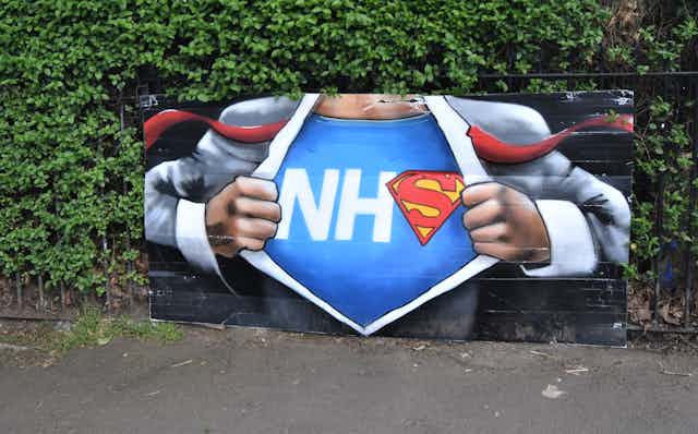 Wall art of a superhero NHS costume