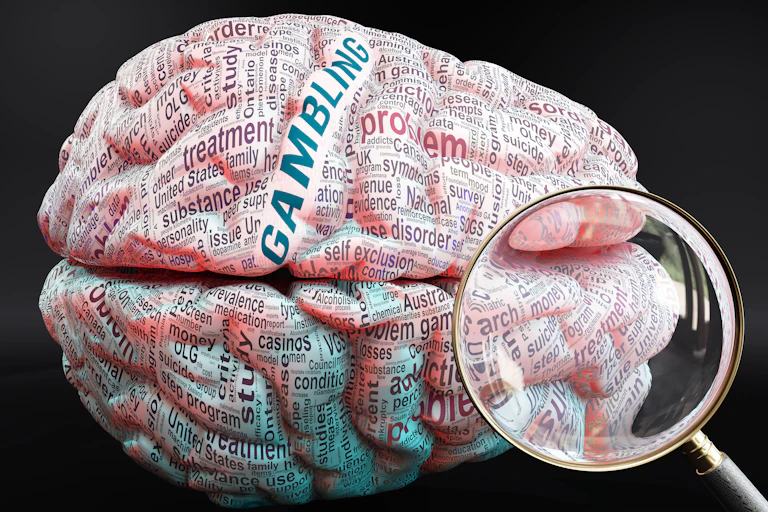 Image of a brain, with hundreds of crucial words related to gambling written on it.