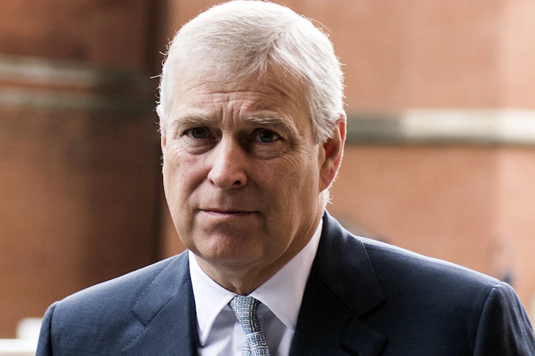 Close-up of Prince Andrew wearing a dark blue suit