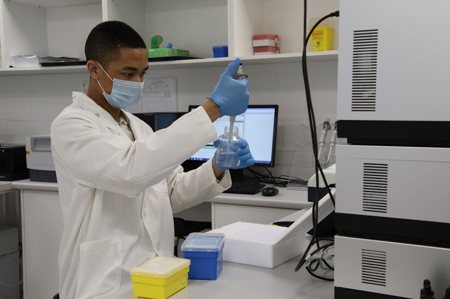 man in lab wearing coat