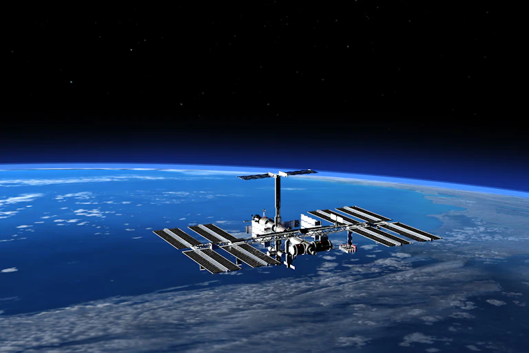 Image of the ISS above Earth.
