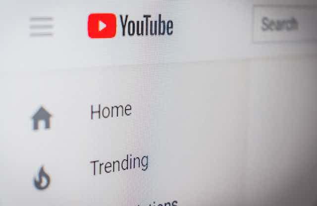 YouTube screen showing HOME and TRENDING