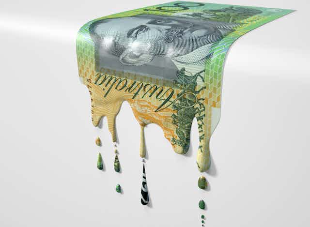 A melting $100 note