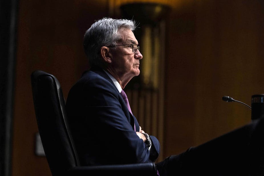 Jerome Powell with his arms folded