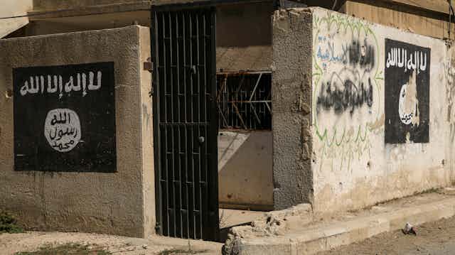 Islamic State graffiti on walls in Aleppo, Syria