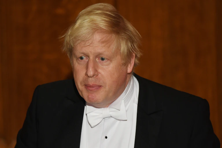 Boris Johnson wearing white tie.