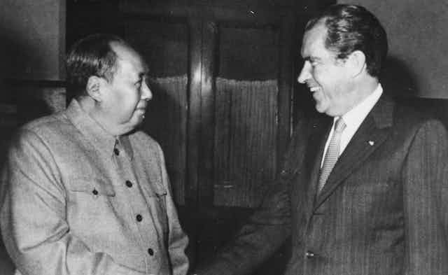 Chairman Mao shakes hands with US president Richard Nixon in Beijing 1972.