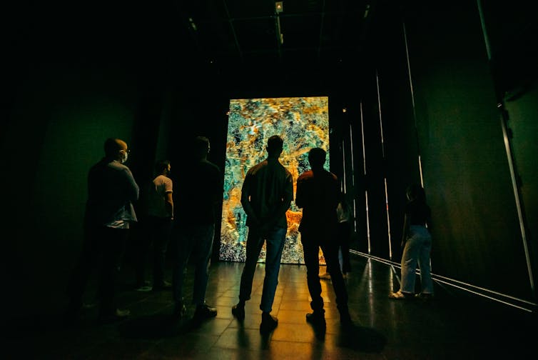 A large screen with swirling earthy colours.
