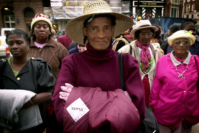 A group of Chagossians protest outside the high court in London.