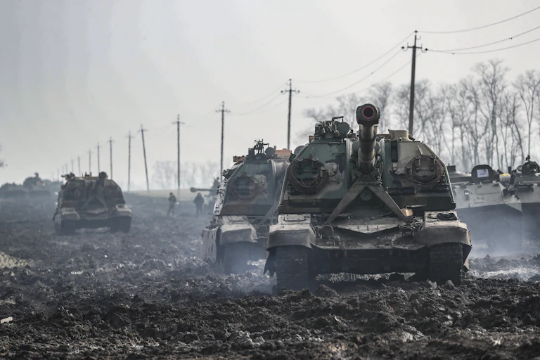 Russian tanks moving through mud
