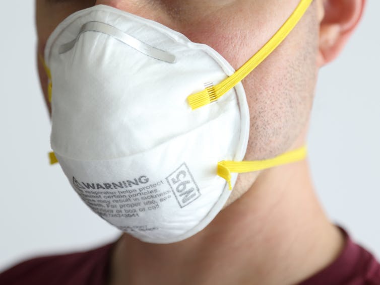 Man wearing an N95 mask.