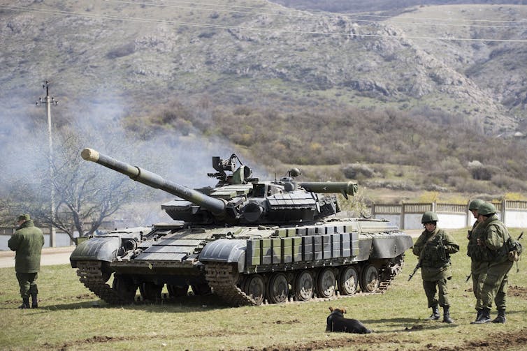 Russian soldiers at a former Ukrainian military base in Crimea