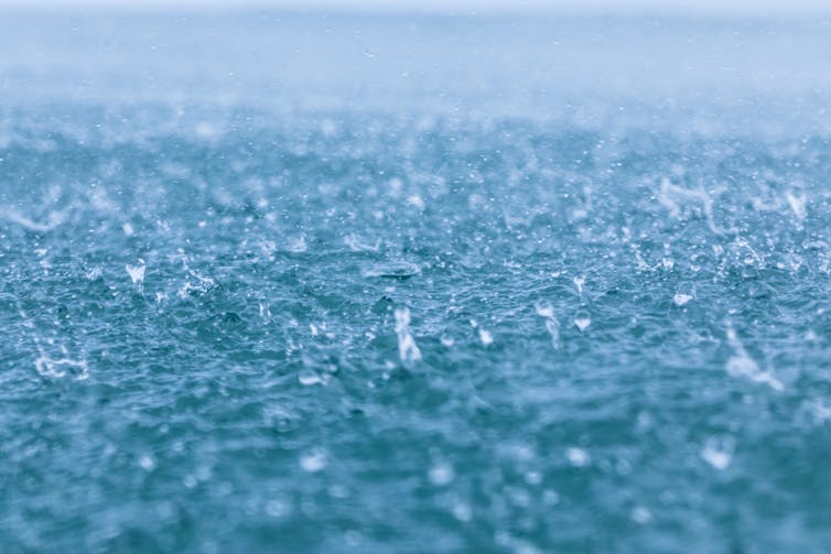 Rain falling on ocean
