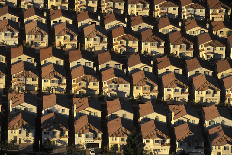 Several rows of houses in close proximity to one another