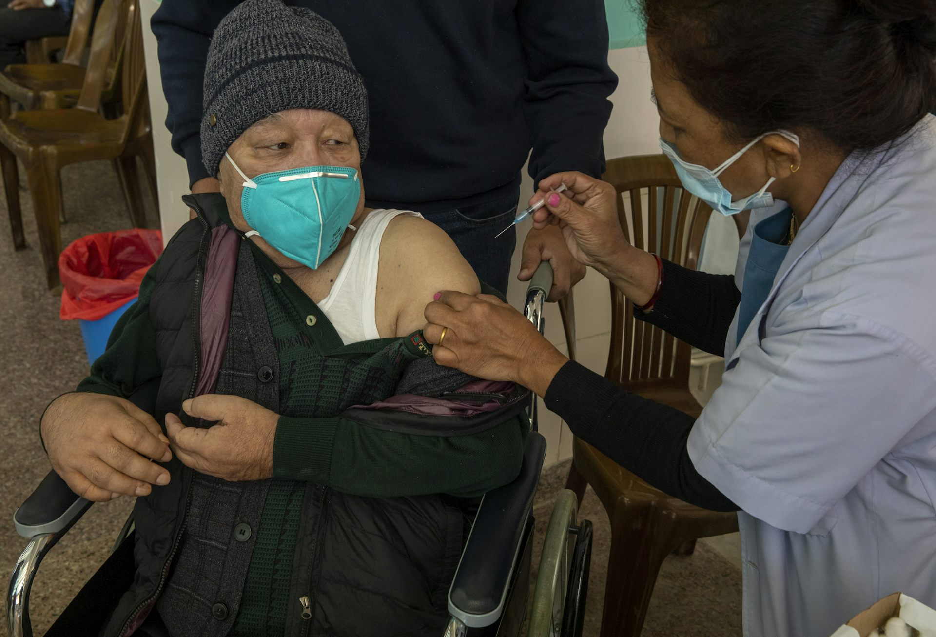 A COVID vaccine being given in Nepal