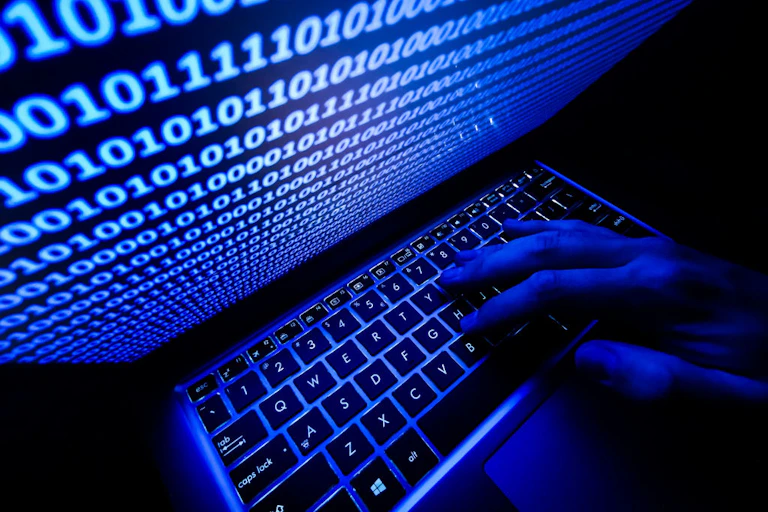 Screen showing binary code.