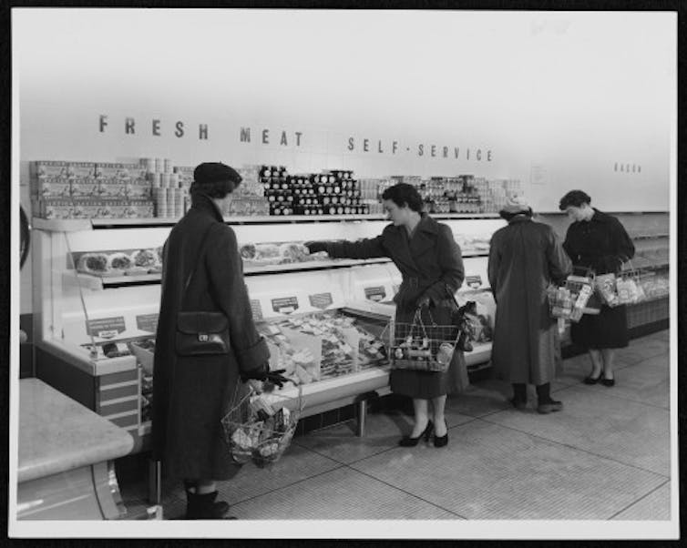 Archive image of shoppers in a supermarket.