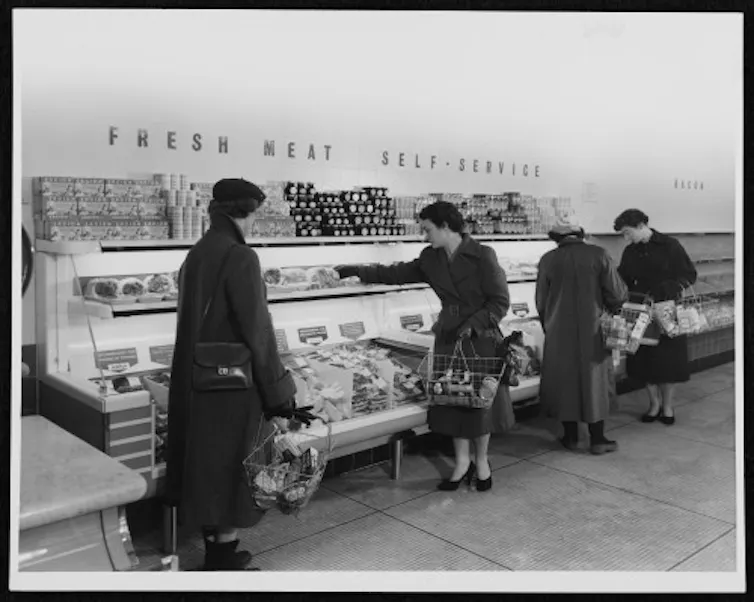Archive image of shoppers in a supermarket.