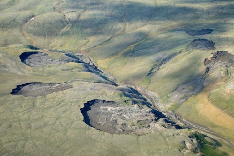 Several slumps along a valley, with signs of more slumps about to form