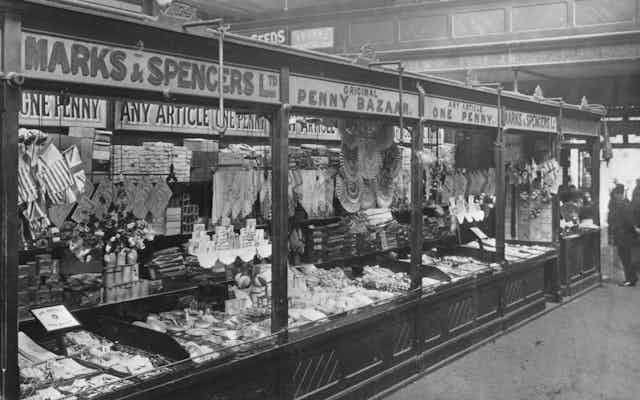 A black and white image of a market stall in 1901.