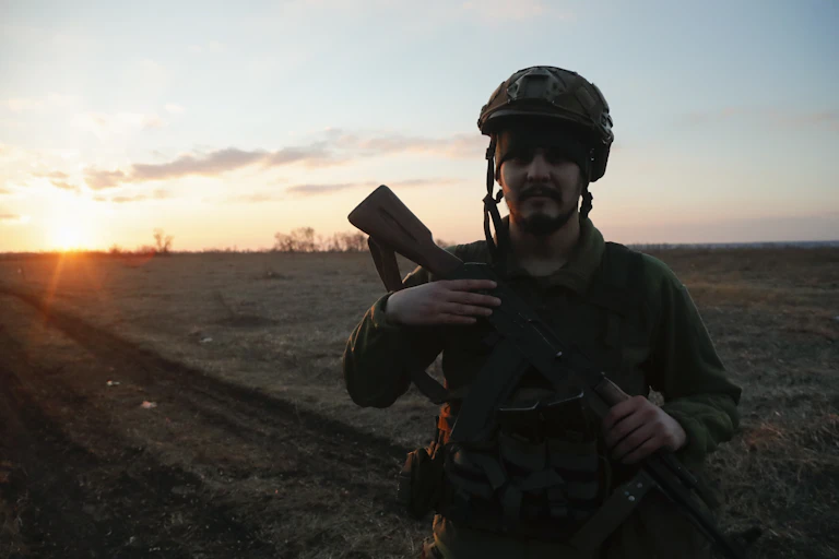 A Ukranian soldier keeps watch.