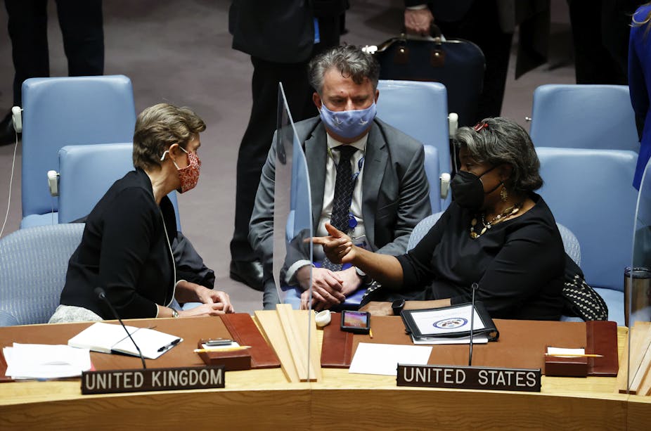 UK Ambassador to the United Nations Barbara Woodward (L) and US Ambassador to the United Nations Linda Thomas-Greenfield (R) talk to Ukraine Ambassador to the United Nations Sergiy Kyslytsya