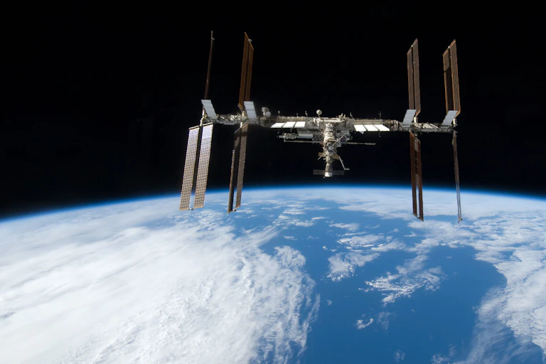The International Space Station floating above the horizon of Earth