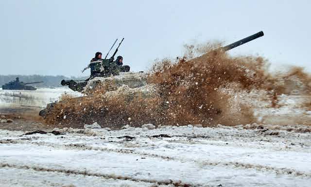 A Ukrainian tank performs training exercises in early February