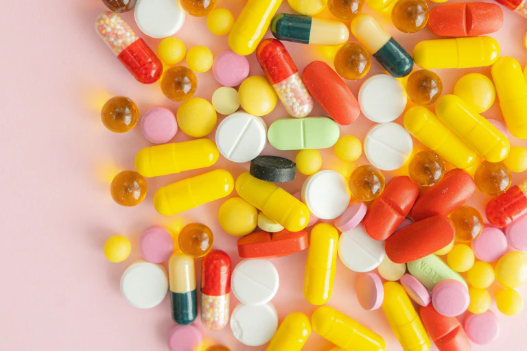 An array of brightly coloured pills and capsules
