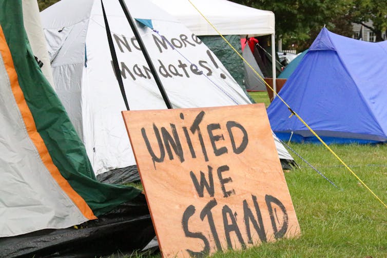 Tent and sign from an anti-mandate protest.