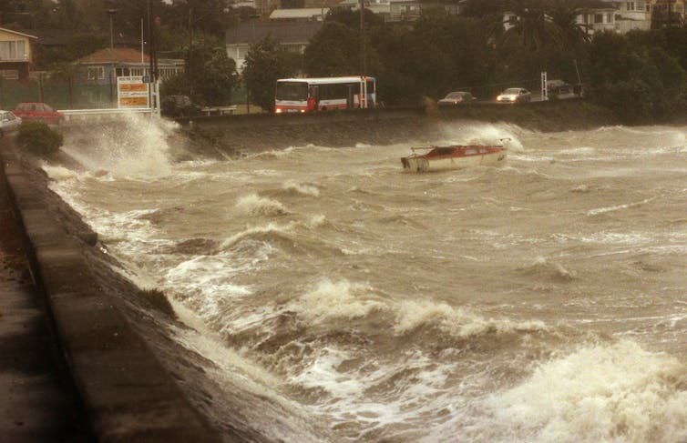 Waves pounding against a sea wall.