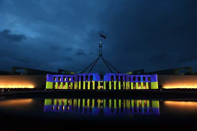 Parliament House lit up the colours of the Ukrainian flag