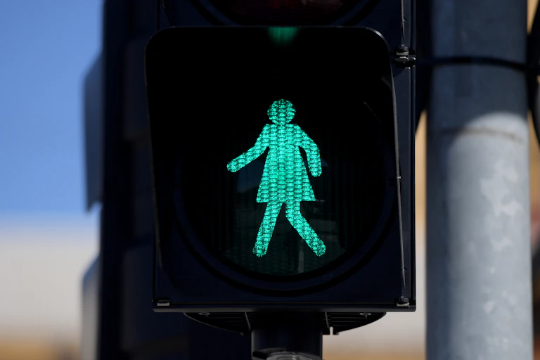 Green female pedestrian light