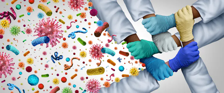 Brightly coloured illustrations of microbes that stop where six arms in white sleeves meet, with their gloved hands clasped to form a barrier