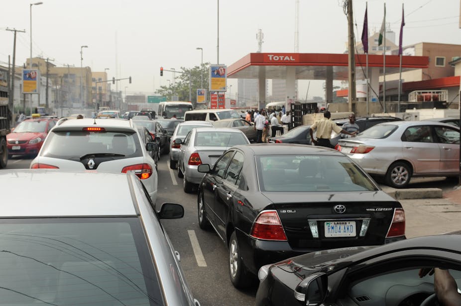 A long queue of vehicles in front of petrol filling station