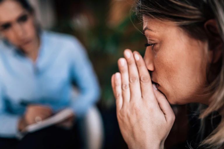 Woman talking to a therapist