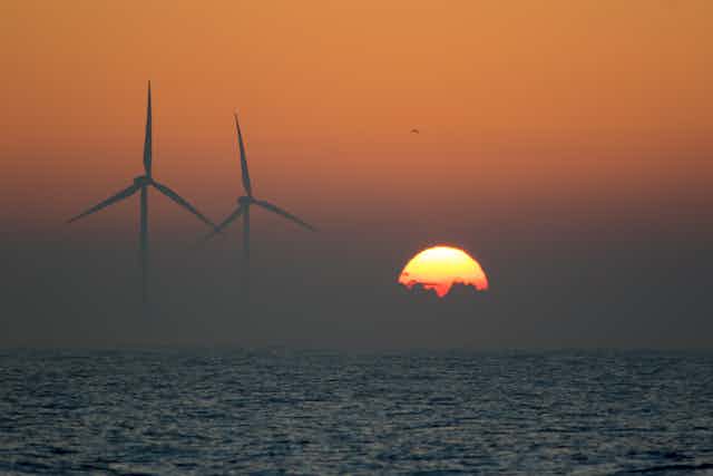 offshore wind farm at sunrise
