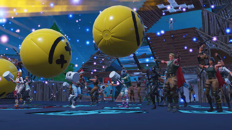 personnes virtuelles sur un plancher de danse avec de gros ballons jaunes