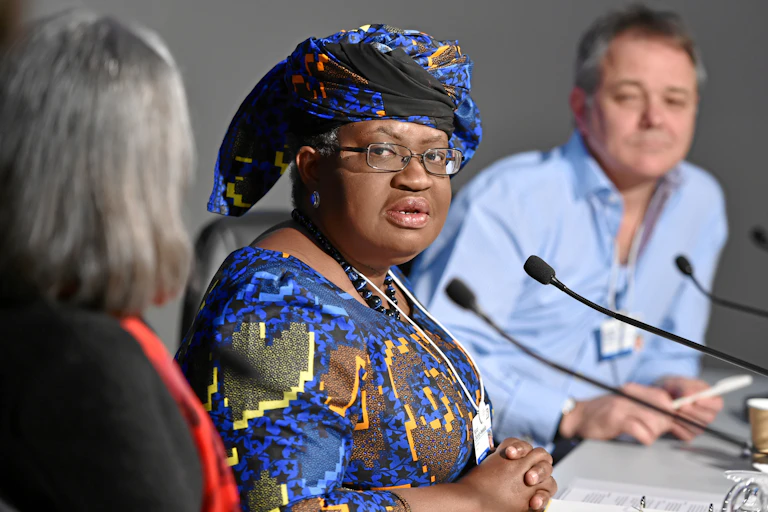 Woman speaking into microphone
