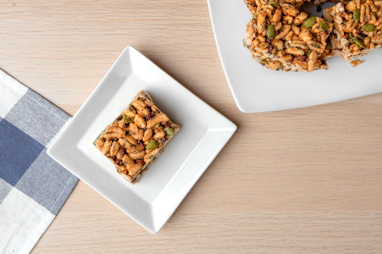 A snack bar on a square white plate