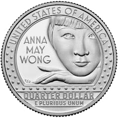 Back of quarter featuring engraving of woman.