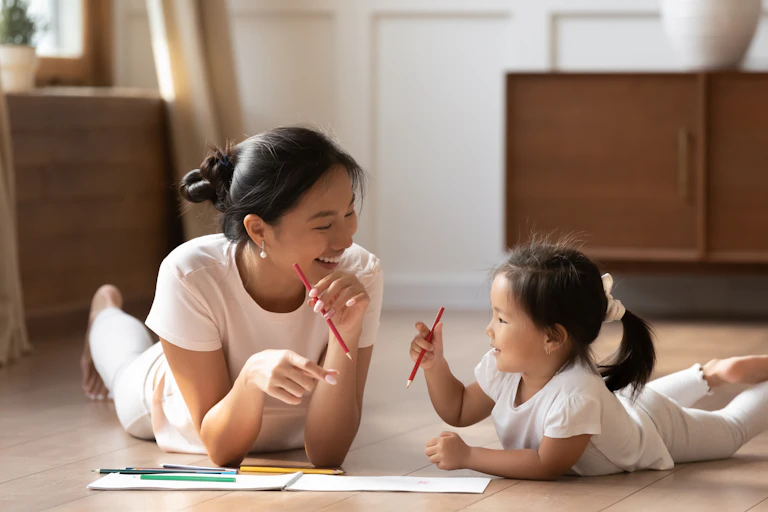 Woman talking to a young child