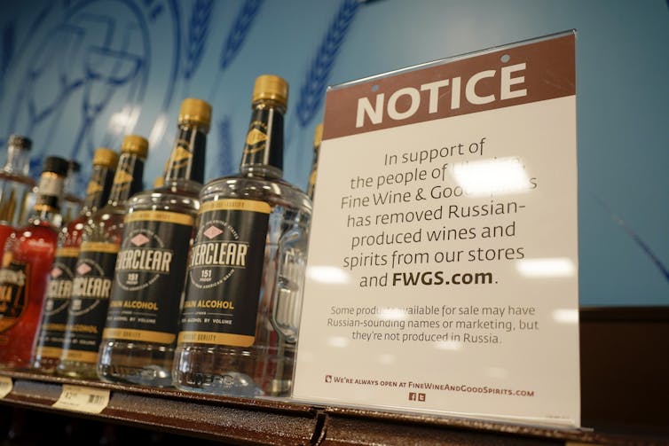 Sign, showing Russian vodka removed from shelves.