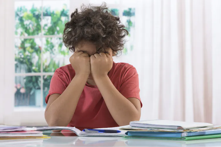 Child struggling with homework