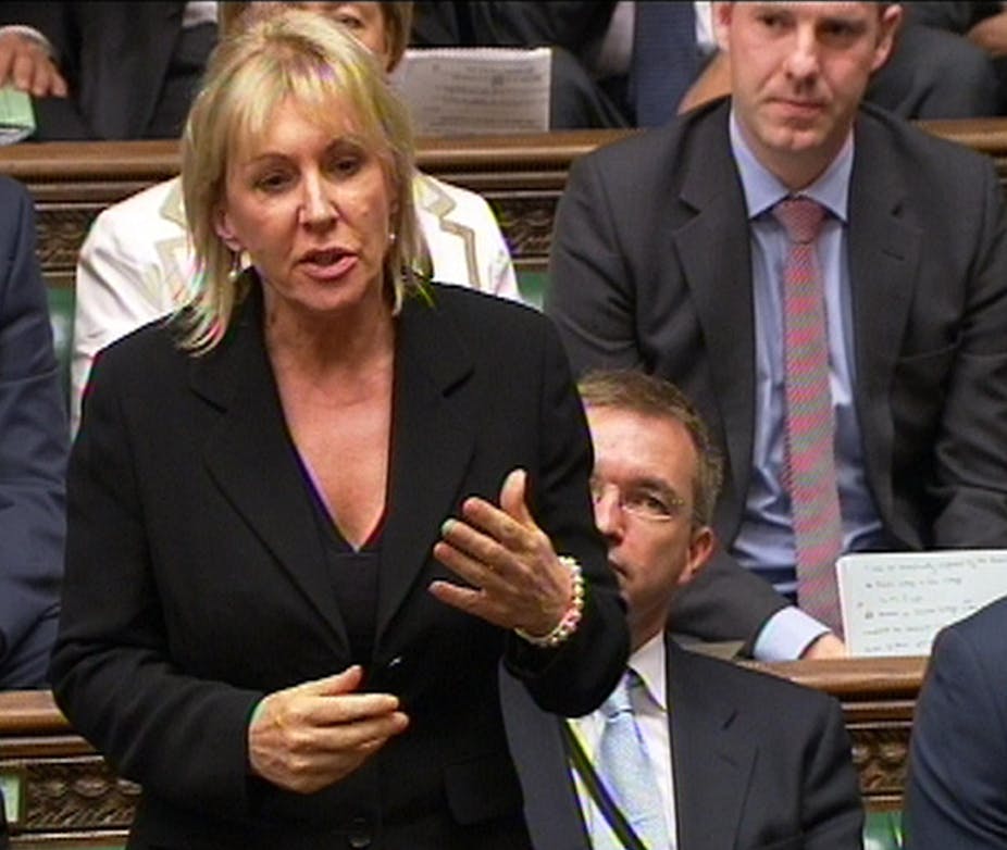 Nadine Dorries wearing a black jacket speaking in the House of Commons.