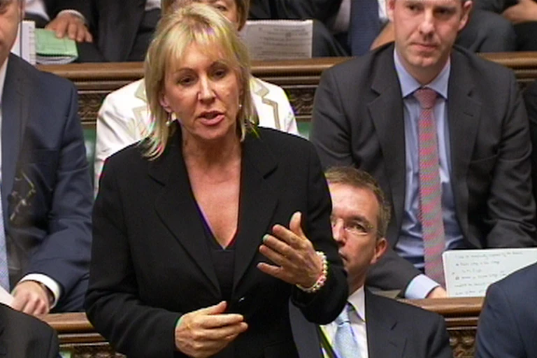 Nadine Dorries wearing a black jacket speaking in the House of Commons.