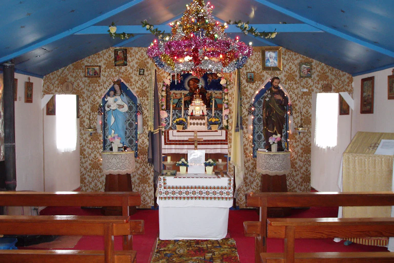 The interior of a homemade Ukrainian PoW chapel in Galloway.