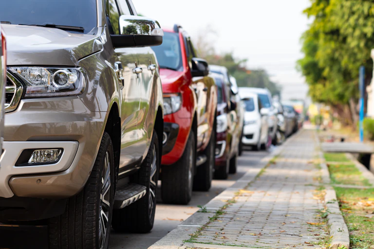 A row of parked SUVs.