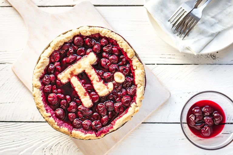 A cherry pie with the pi symbol on it.