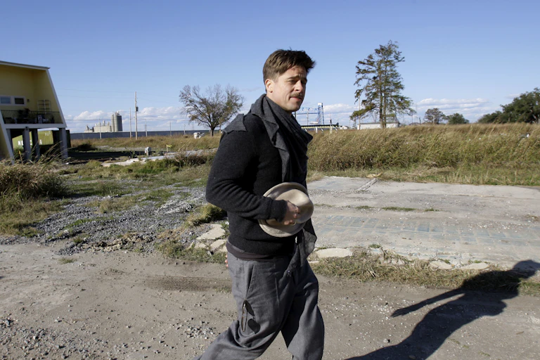 Brad Pitt, walking through a construction site